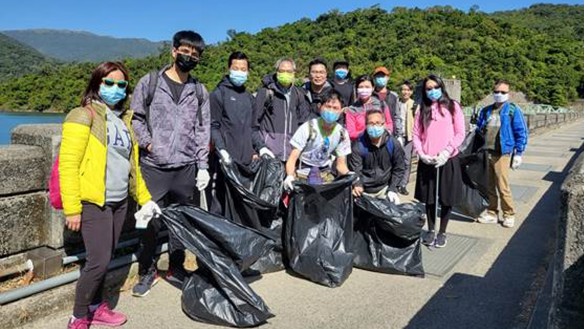 picking up trash along the trail